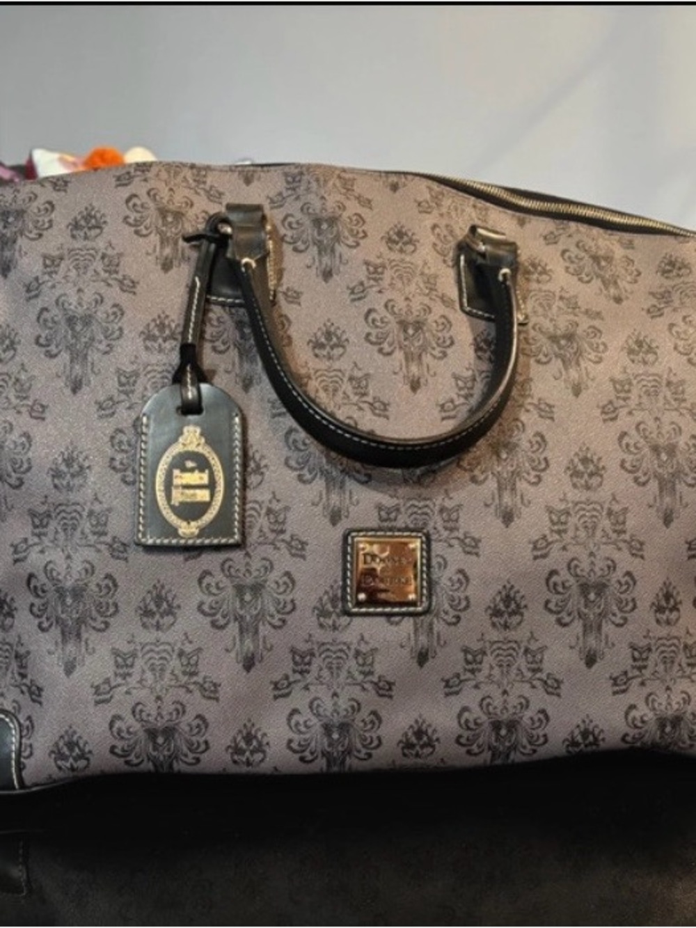 Dooney & Bourke x Disney hunted mansion duffle bag